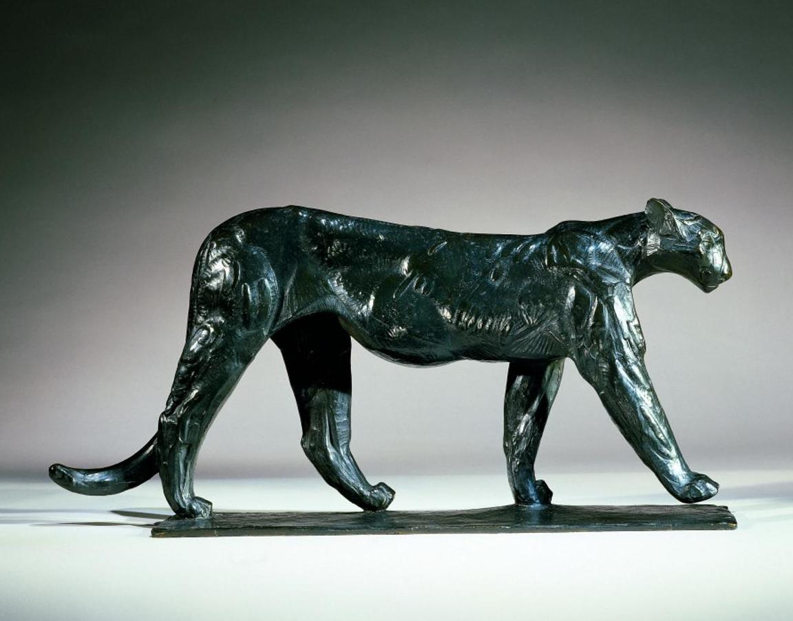 Puma mâle en bronze nuancé de brun et de noir