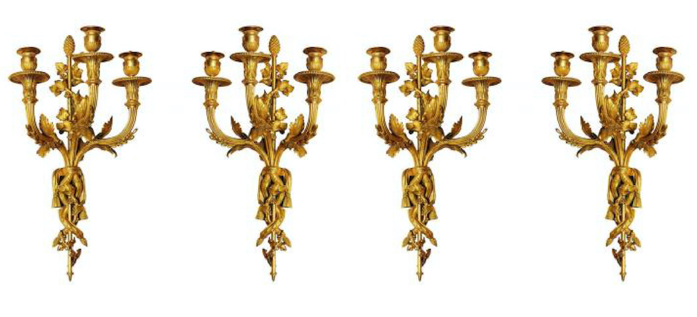 Suite de quatre appliques en bronze doré et ciselé (attribuée à)