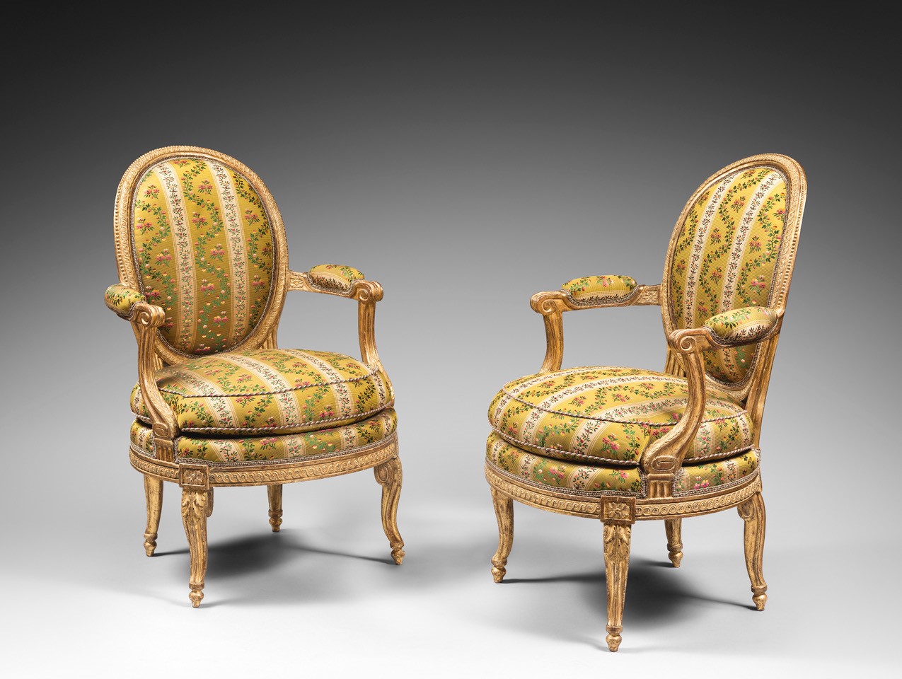 A rare pair of Louis XVI giltwood armchairs By Geroges Jacob